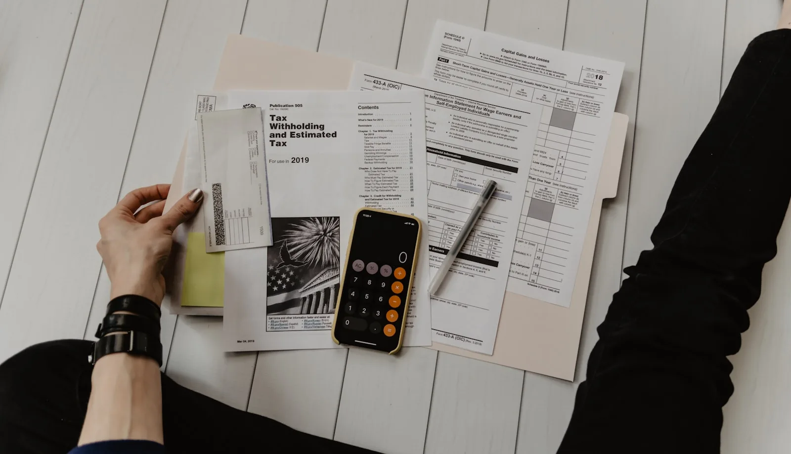 Accounts and figures being reviewed on a desk